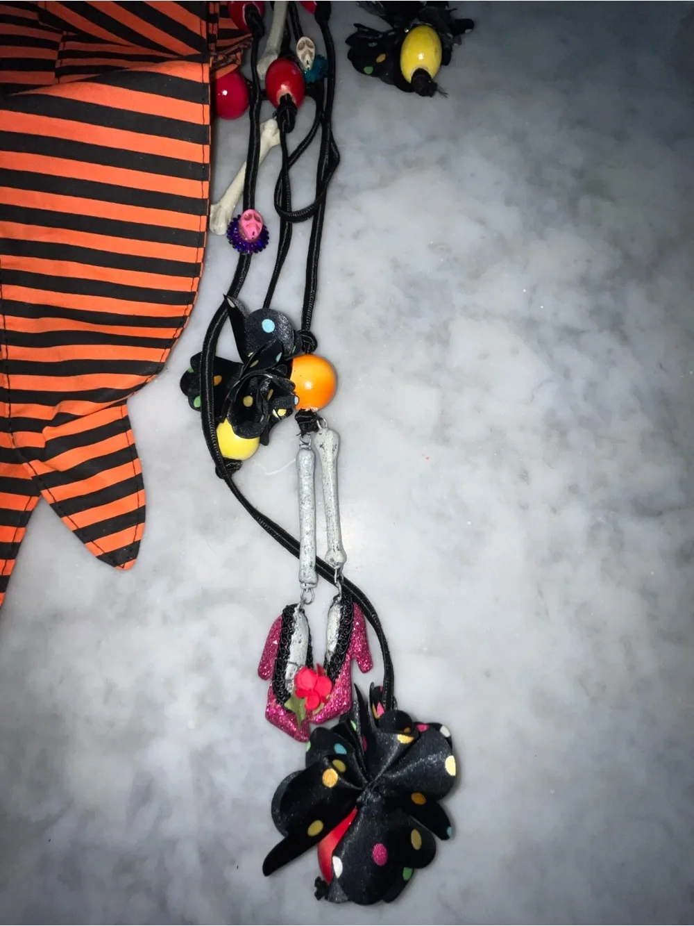 Orange and Black Striped Bow Belt Accent with Decorative Skull